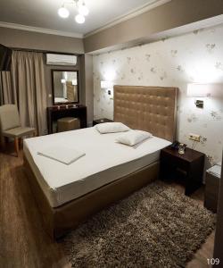 Postel nebo postele na pokoji v ubytování Atlantic Hotel