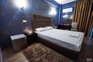 Postel nebo postele na pokoji v ubytování Atlantic Hotel