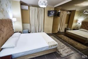Postel nebo postele na pokoji v ubytování Atlantic Hotel
