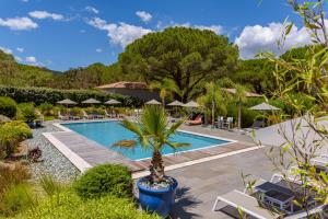A view of the pool at Les Pins de Santa Giulia or nearby