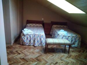 Postel nebo postele na pokoji v ubytování Casa Rural La Infanta