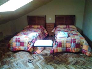 Postel nebo postele na pokoji v ubytování Casa Rural La Infanta