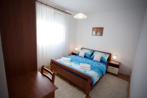 Katil atau katil-katil dalam bilik di Zvijezda Mora Apartment