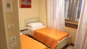 Postel nebo postele na pokoji v ubytování I 13 Cavalieri Guest House