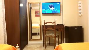 TV a/nebo společenská místnost v ubytování I 13 Cavalieri Guest House