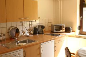 Køkken eller tekøkken på Insel der Freude + 4 billeder