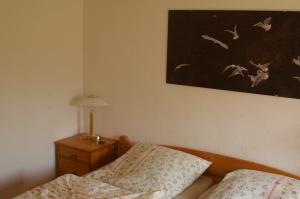 En eller flere senge i et værelse på Insel der Freude