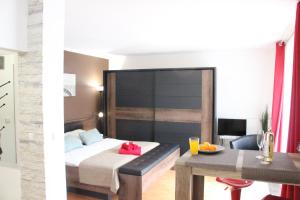 TV a/nebo společenská místnost v ubytování Apartmán se zahrádkou v krásné čtvrti Berouna