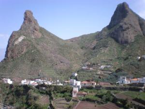 a mountain with a small town in front of it at Casa del Cu bano B- Biosphere Reserve in Santa Cruz de Tenerife