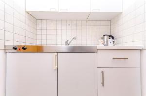 Kuchyň nebo kuchyňský kout v ubytování Apartments Mate + 37 fotografií