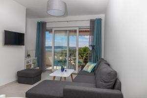 Ein Sitzbereich in der Unterkunft Apartments Zorica
