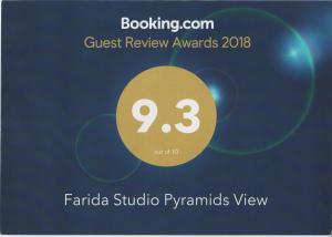 Vottorð, verðlaun, skilti eða annað skjal til sýnis á Farida Pyramids Boutique Hotel