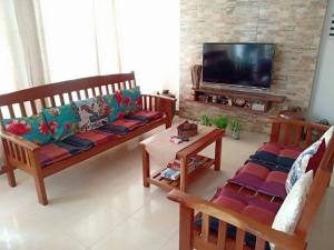TV a/nebo společenská místnost v ubytování Farmer's Guesthouse