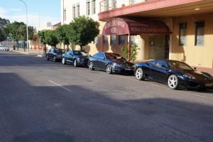 a row of cars parked in front of a building at Royal Exchange Hotel in Broken Hill