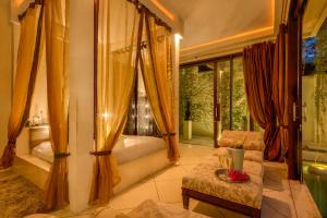 Ένα ή περισσότερα κρεβάτια σε δωμάτιο στο Villa One Seminyak