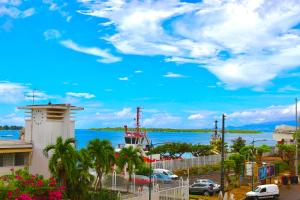 a view of a body of water with a boat at Nawalie in Pointe-à-Pitre