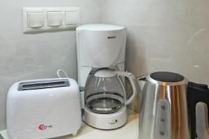 Coffee and tea making facilities at BLUE PHAISTOS APARTMENTS No1