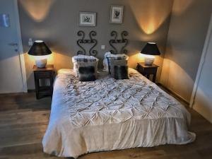 Postel nebo postele na pokoji v ubytování Hotel Ter Polders