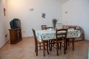 TV a/nebo společenská místnost v ubytování Poggio Picchio