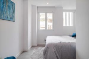 Posteľ alebo postele v izbe v ubytovaní Marbella Beach Sea views City Center Apartment