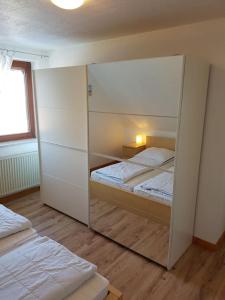 Wohnung Burgstaaken tesisinde bir odada yatak veya yataklar