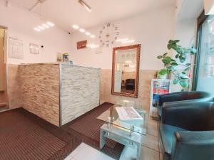 TV a/nebo společenská místnost v ubytování Angel Hotel