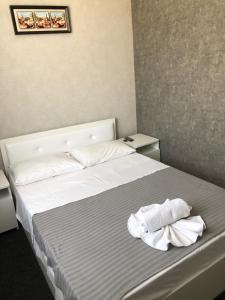Postel nebo postele na pokoji v ubytování MEDELEAN HOTEL