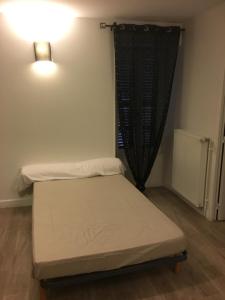 Postel nebo postele na pokoji v ubytování Chambres d'Hôte Les Bredins