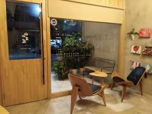 A seating area at Shan Shan Come Later