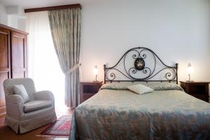 Posteľ alebo postele v izbe v ubytovaní Dimora Palazzo La Fenice