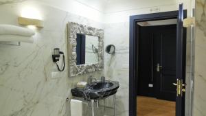 Koupelna v ubytování Hotel Marechiaro