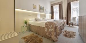 Postel nebo postele na pokoji v ubytování Anette Hotel