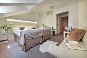 Postel nebo postele na pokoji v ubytování Anette Hotel