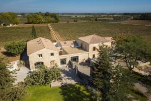 an aerial view of a house in a field at Domaine la Clausade in Mauguio