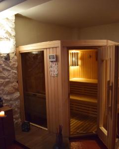 a sauna in the corner of a room at Hagiati Anastasiou Hotel & Spa in Naousa