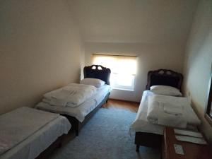 Letto o letti in una camera di DownTown B&B