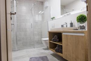 Koupelna v ubytování Apartmány Speicher + 20 fotografií