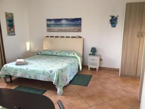 Letto o letti in una camera di Sardegna Mer et Soleil in Olbia