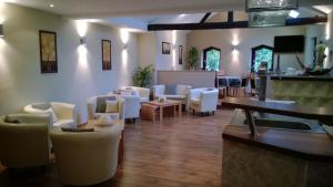 Zona de estar de Landhotel Vierjahreszeiten