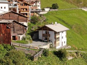 a house on the side of a hill at La Trapla in Samnaun