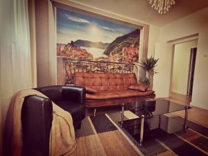 A seating area at Casa Coqueta y confortable en Oviedo