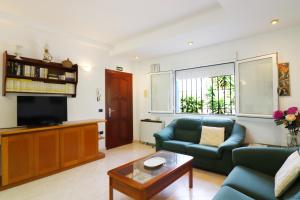 TV a/nebo společenská místnost v ubytování Apartment Zafiro Meneguina by SpainSunRentals 1120