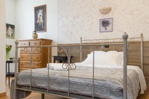 Postel nebo postele na pokoji v ubytování Le Camere Di Aladino