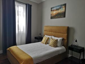 Postel nebo postele na pokoji v ubytování Bruma Home