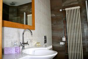 Koupelna v ubytování B&B Le Tapis Rouge