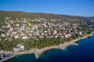 an aerial view of a town on the shore of the water at Apartments Oaza in Dramalj