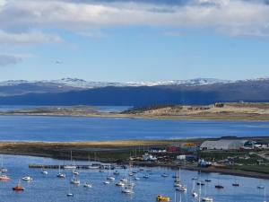 a group of boats docked in a body of water at LiveUshuaia Beagle View in Ushuaia