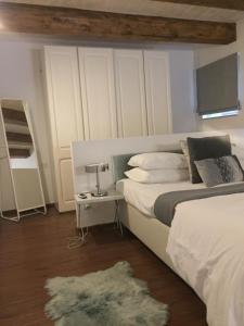 Een bed of bedden in een kamer bij Casa Cara