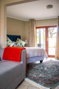 Ένα ή περισσότερα κρεβάτια σε δωμάτιο στο Pro Active Guest House