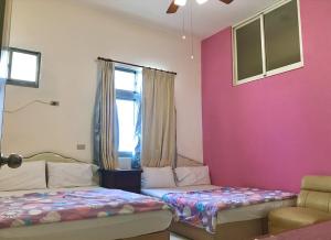 Vuode tai vuoteita majoituspaikassa Fu Yuan B&B